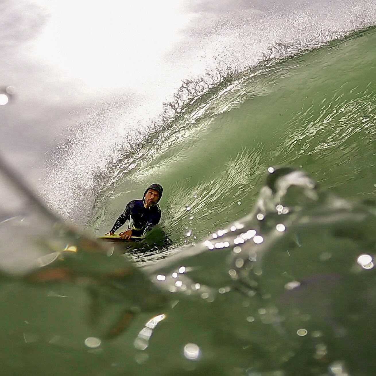 Bodyboarder under the lip